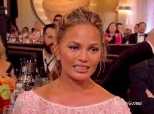 chrissy teigen golden globes cry face